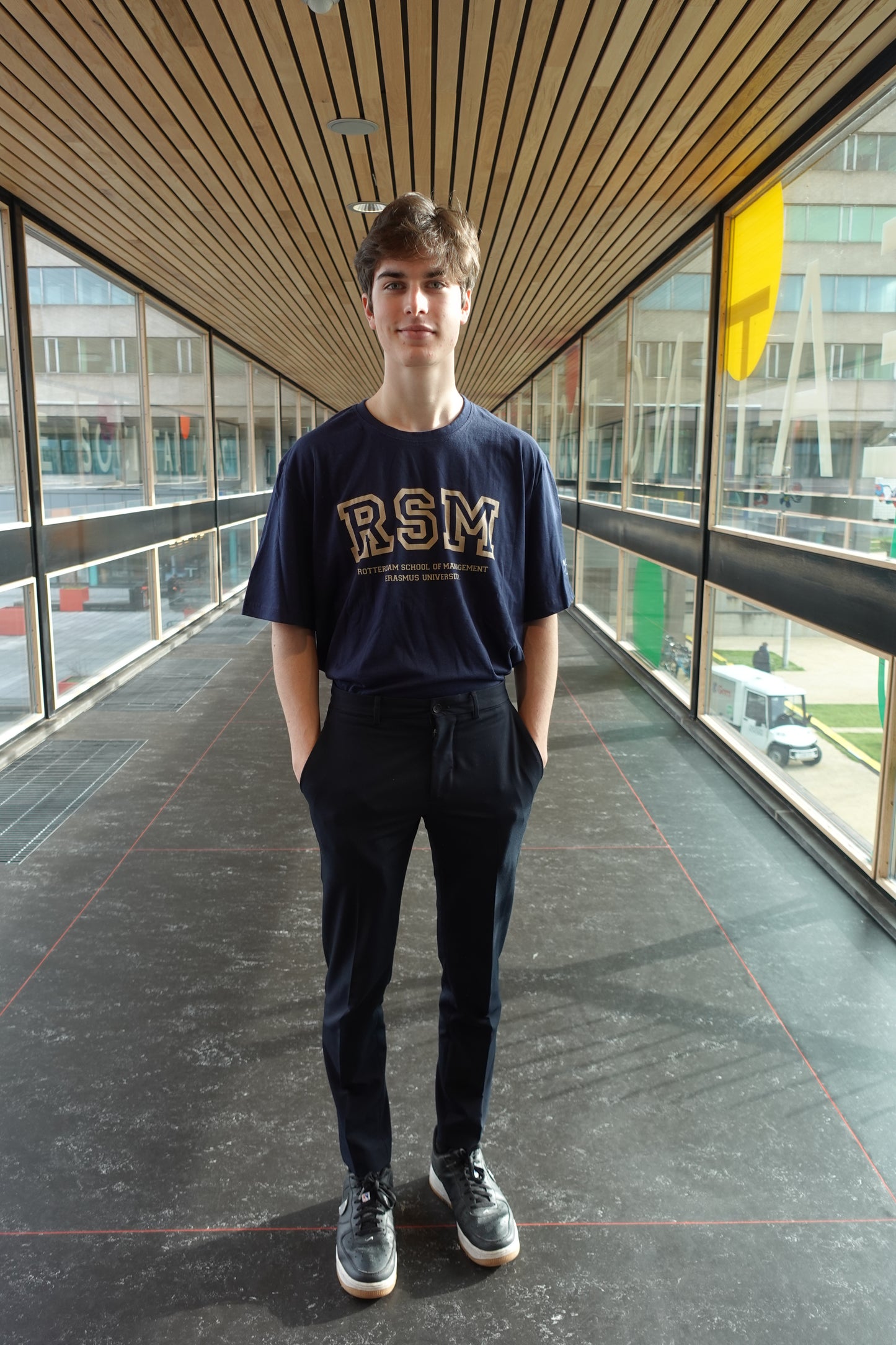 Blue T-shirt with a golden design